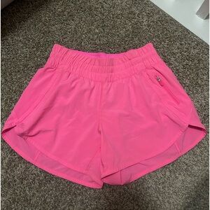 Bright pink lululemon shorts